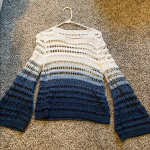 Blue and white sweater.